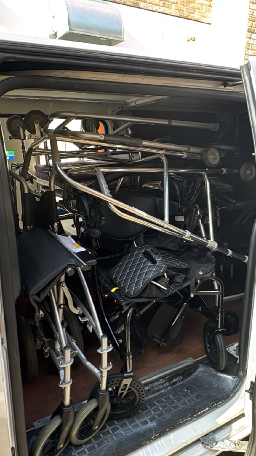 Van loaded with donated wheelchairs and mobility equipment collected for ReStart Mobility
